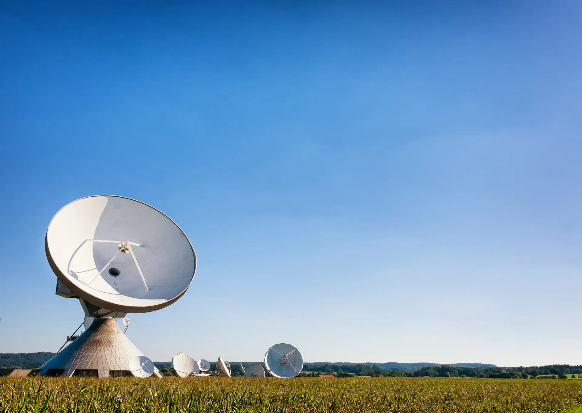 Satellite earth stations in an open field